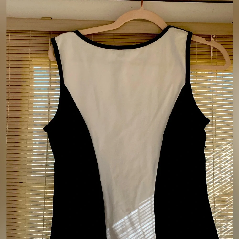 Fitted sleeveless logo top. Never worn, top has stretch. Made in USA. - Picture 3 of 4